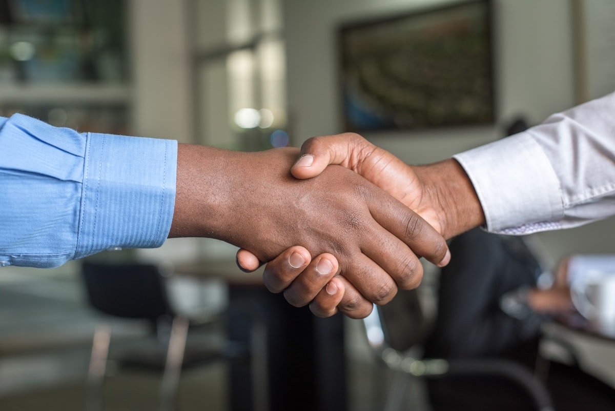 Investor partnership handshake